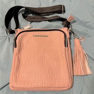 Steve Madden Brand New Logo crossbody bag with fringe accent in pastel pink